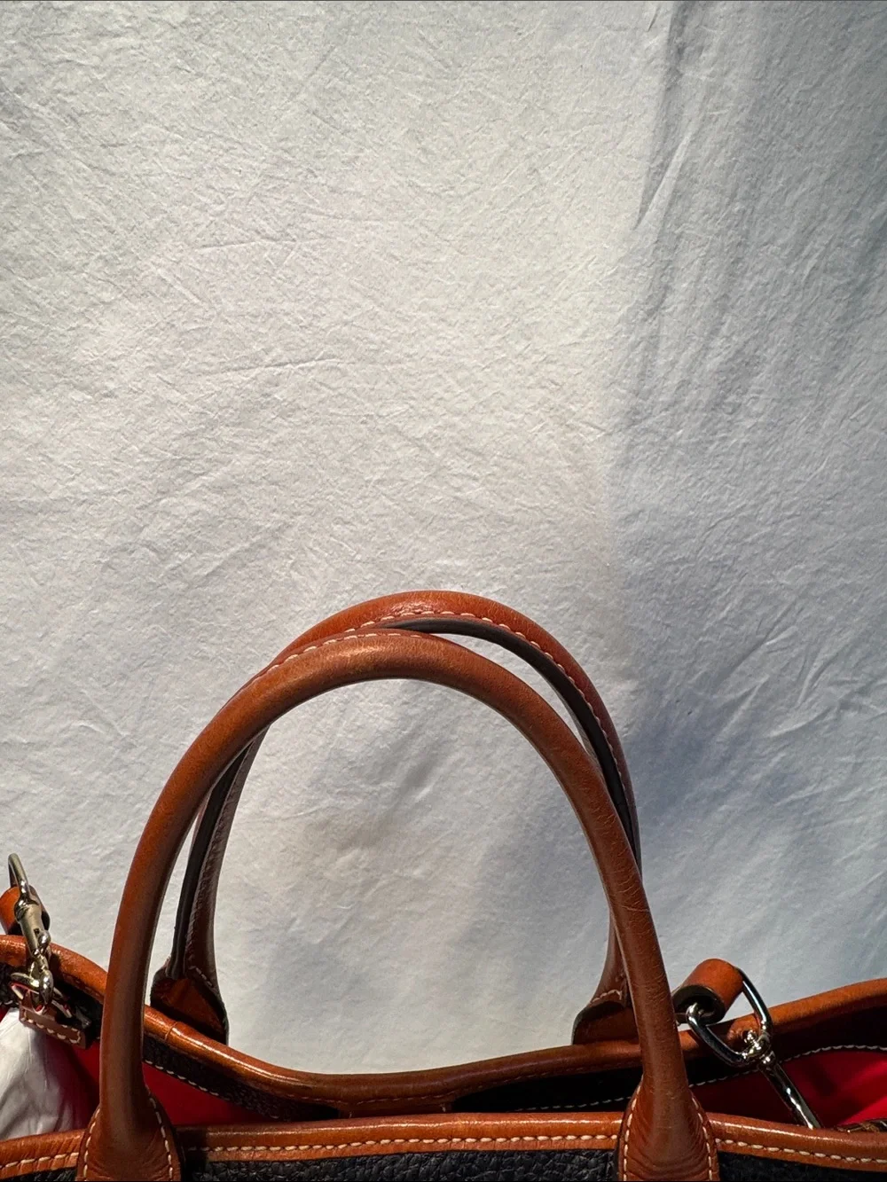 Dooney & Bourke Black Pebbled Leather Tote with Brown Trim & Handles
